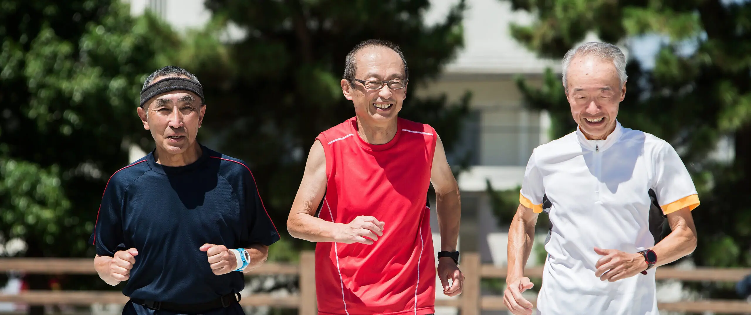 Senior men enjoying jogging with friends