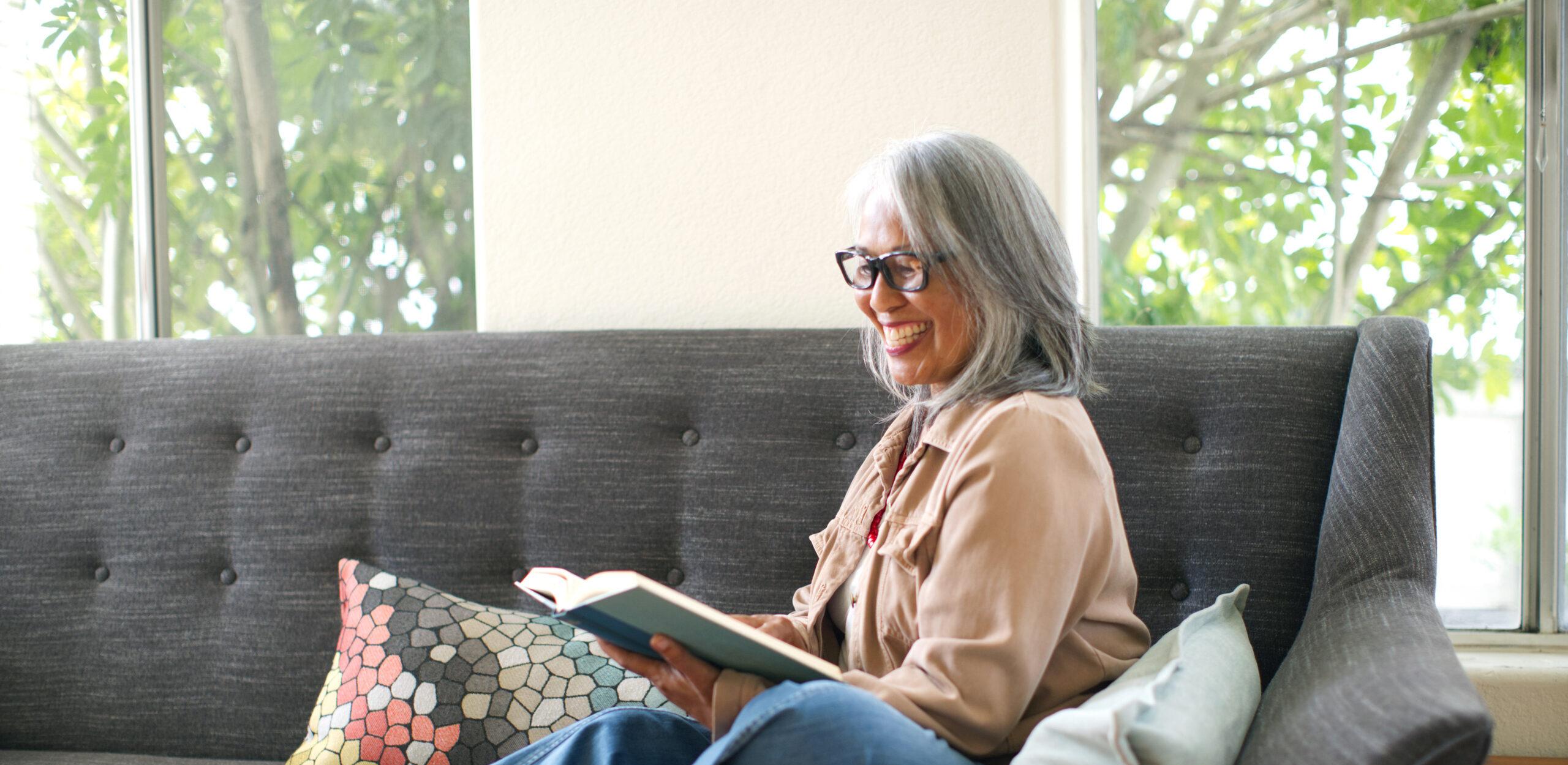 Older woman reading a book